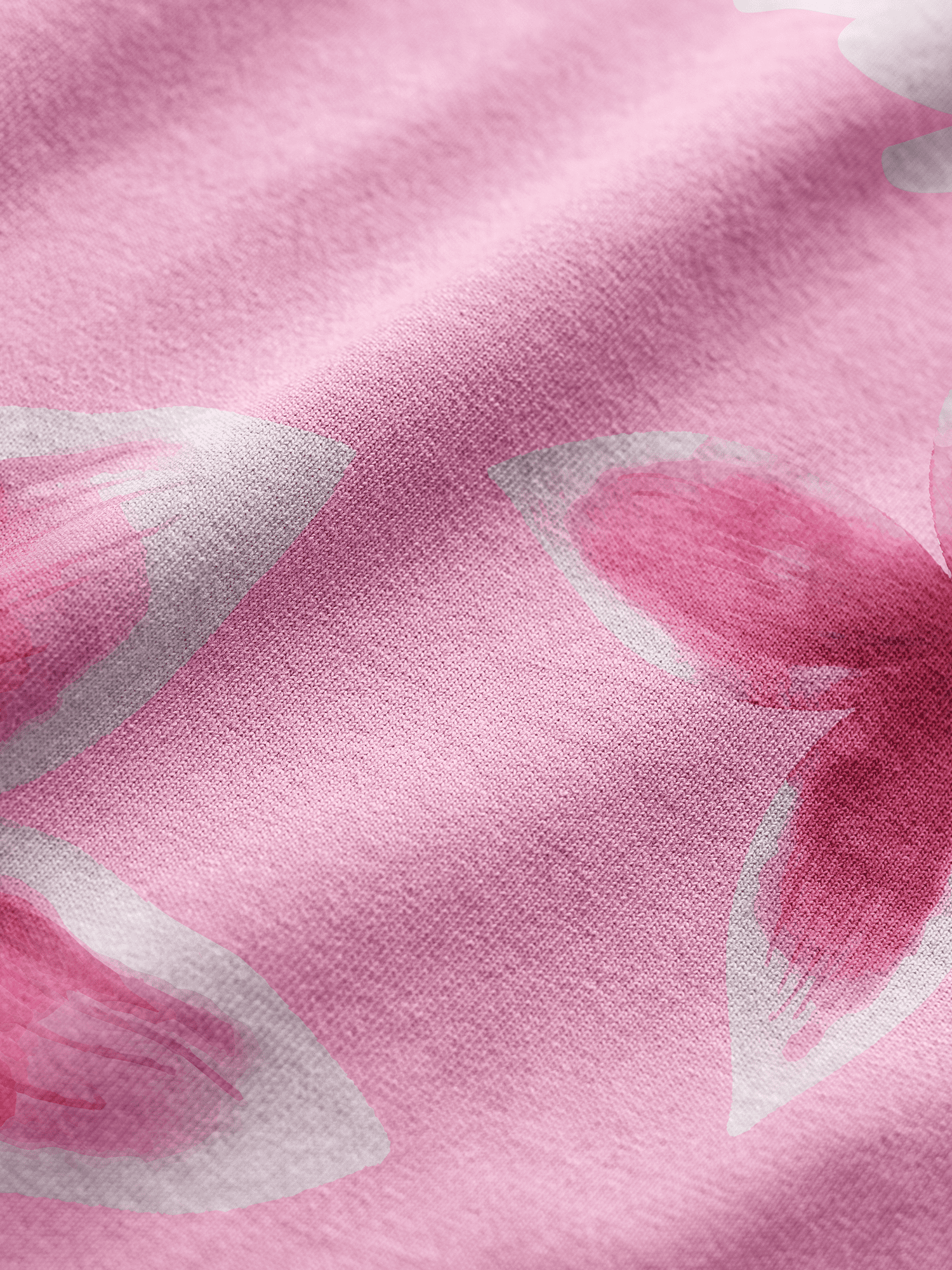 Close-up of pink fabric with floral patterns
