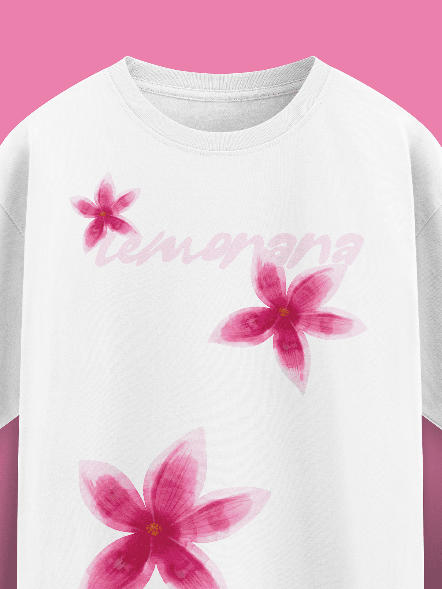 White t-shirt with pink floral designs and 'Lemonana' text on a pink background