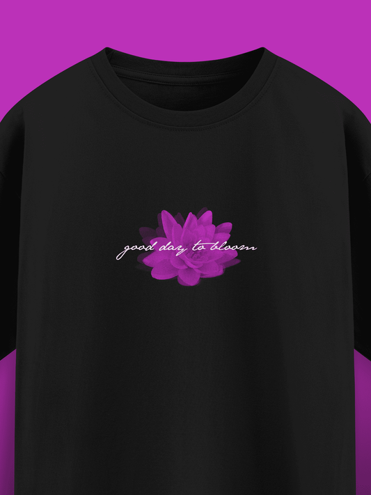 Black t-shirt with a purple flower and text on a purple background