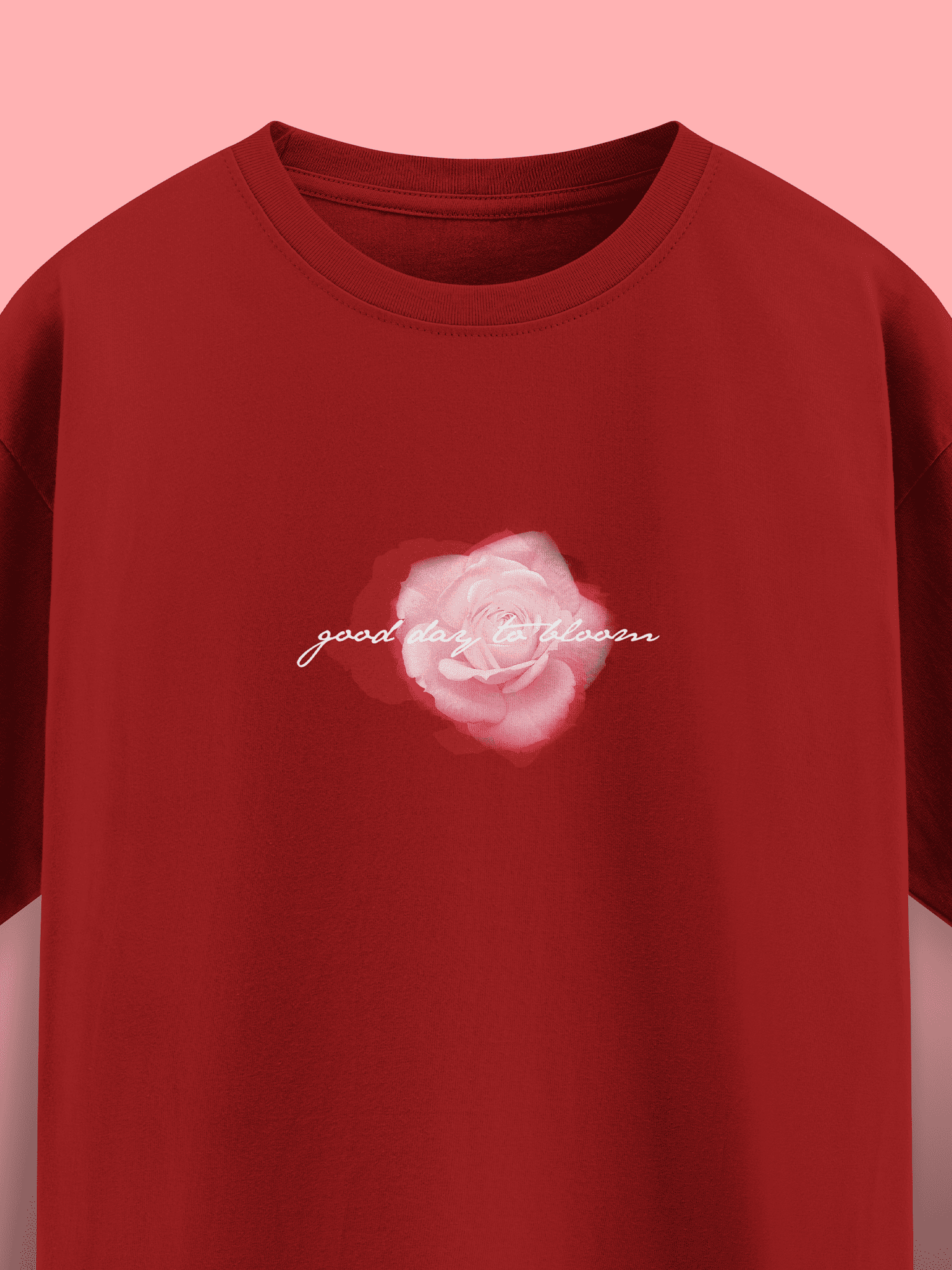 Red t-shirt with a pink flower graphic and text on a pink background
