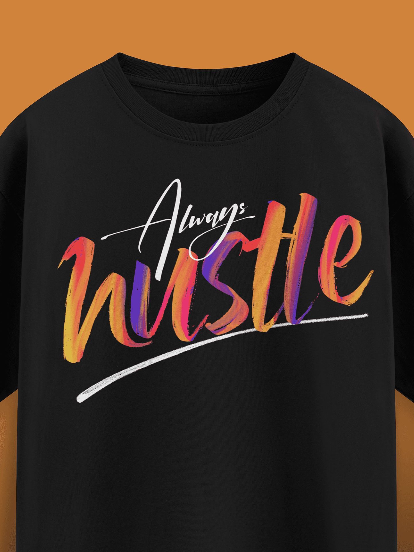Black t-shirt with 'Always Hustle' text in colorful gradient on a brown background