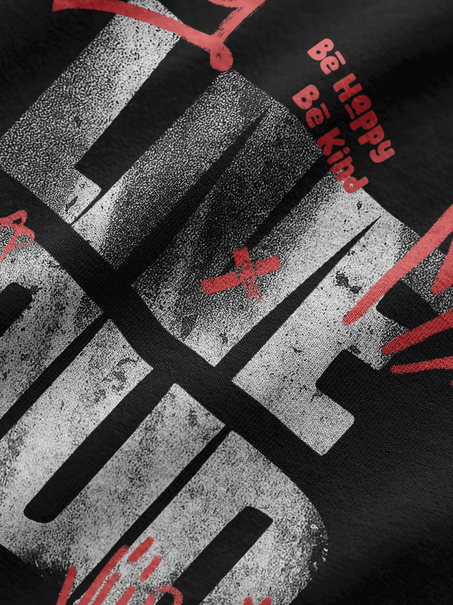 Black t-shirt with red and white text and graphics on a black background